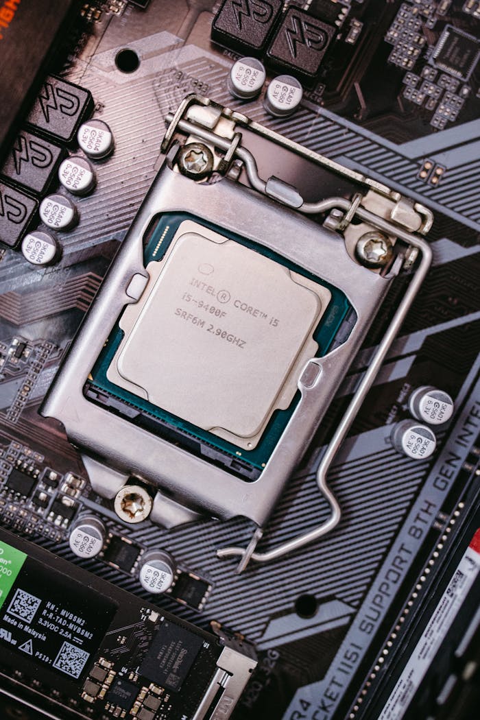 Detailed view of an Intel CPU installed on a motherboard highlighting technological components.